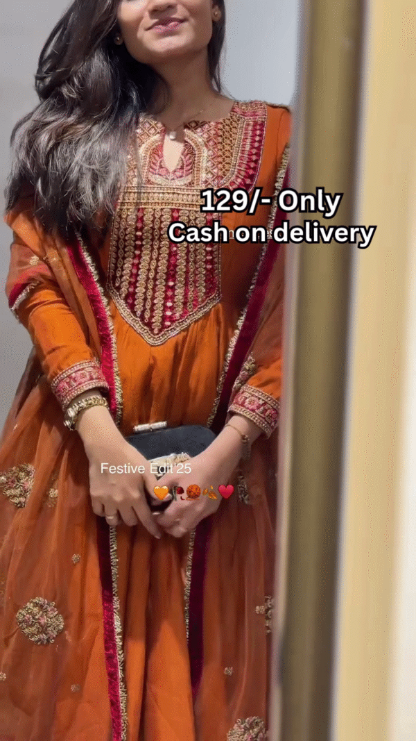 Women’s Orange Embroidered Kurti with Gold & Red Threadwork – Festive Ethnicwear Styled with Black Clutch Accessory
